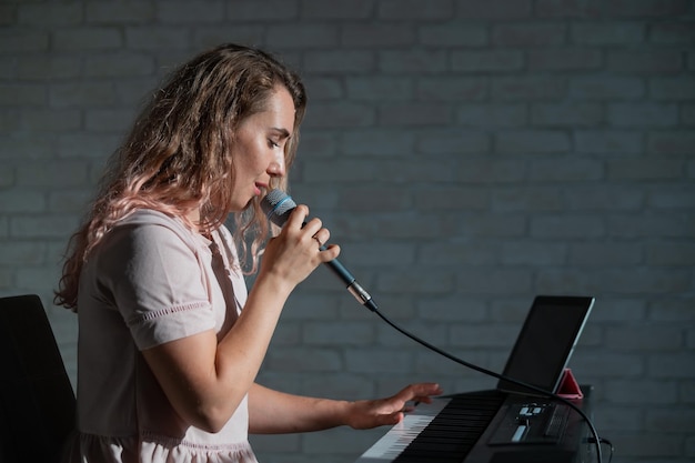 Professional vocal training session demonstrating singing lessons techniques