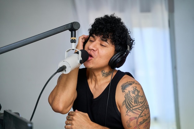 Voice training instructor teaching proper singing technique to student